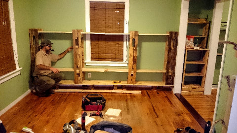 Picture of custom pallet wood shelving installation