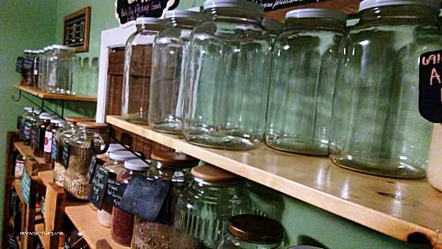 Picture new glass storage jars and shelves for organic bulk dry goods 